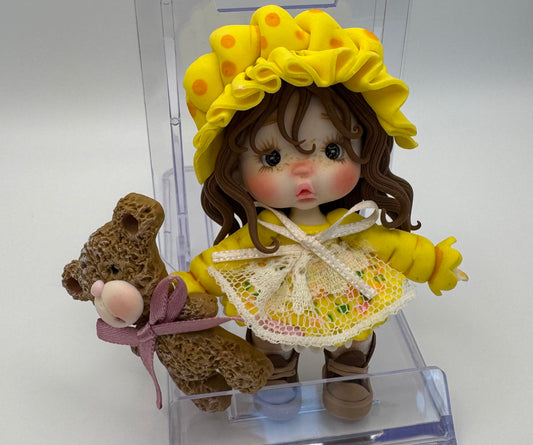 Yellow teddy bear girl