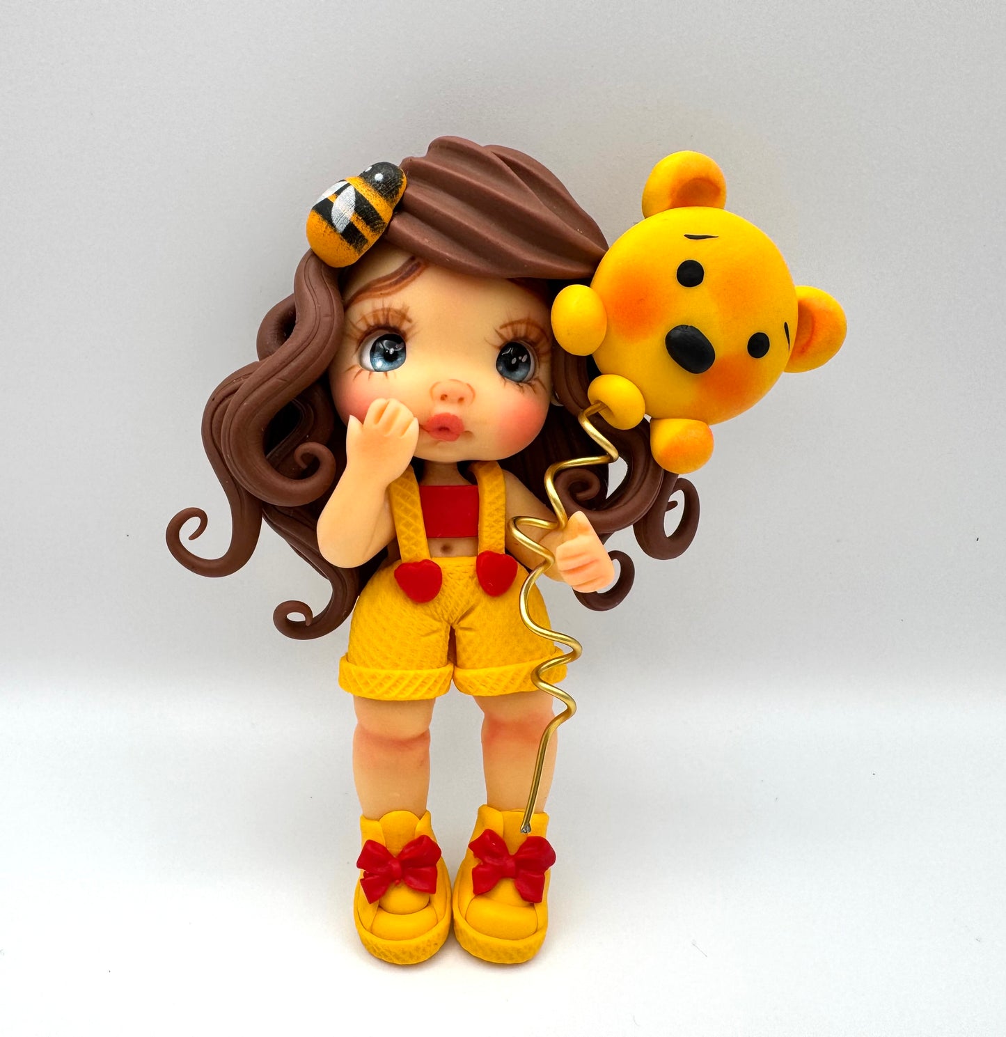 Girl w/pooh ballon