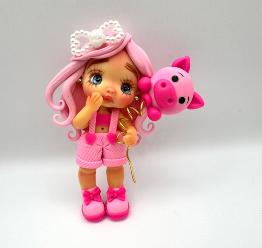 Girl w/ piglet balloon