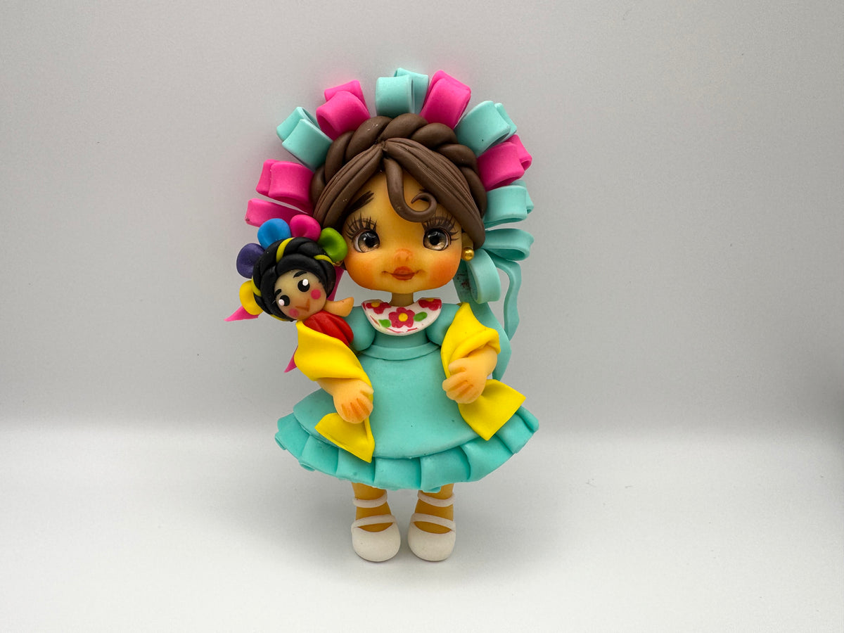 Mexican girl w/doll